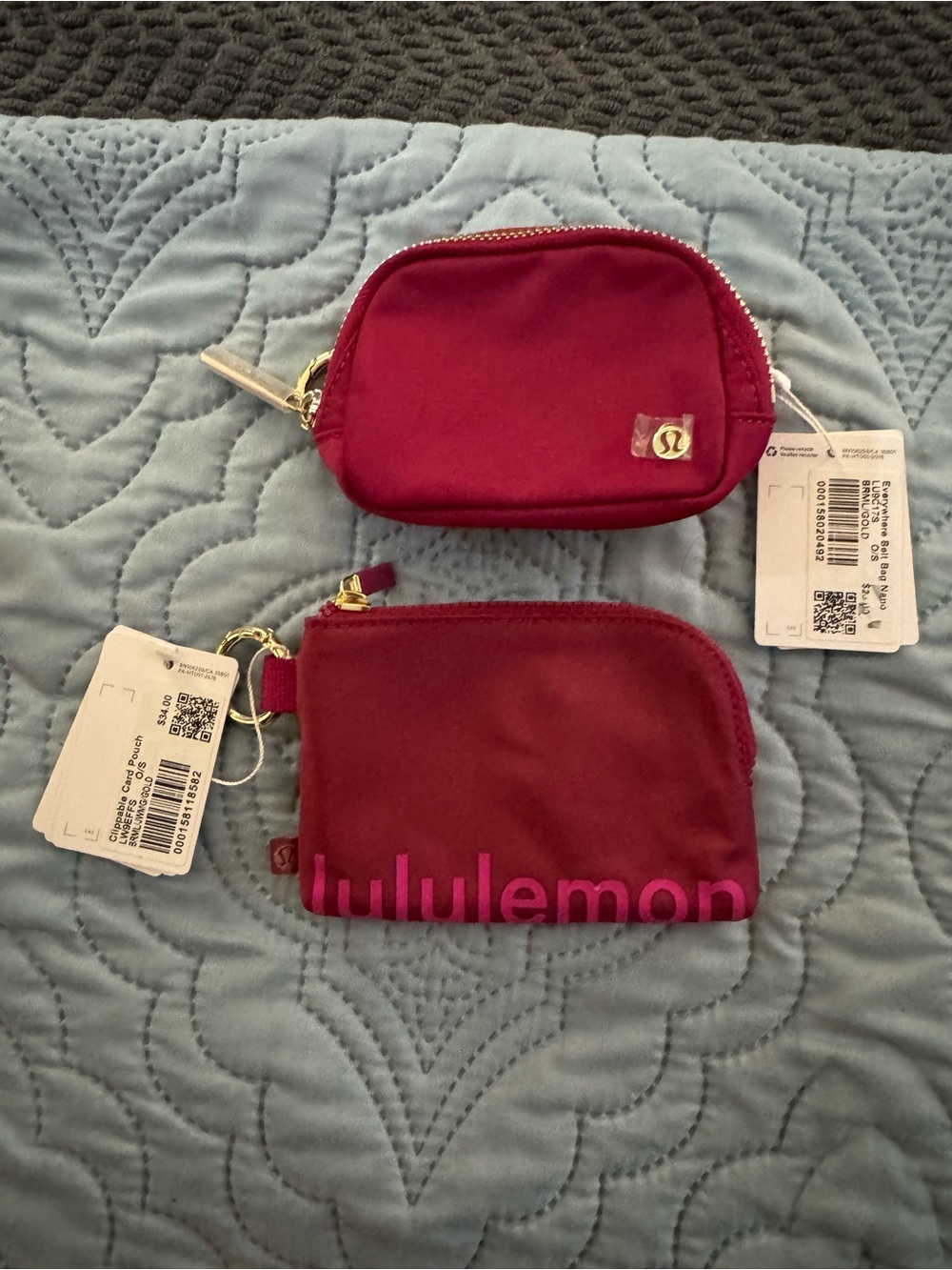 lululemon small zip pouch in deep pink with gold hardware